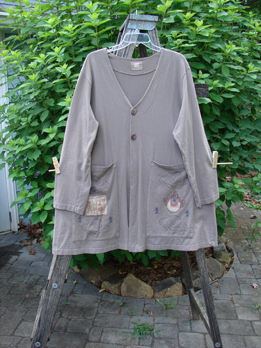 1999 Triangle Jacket Far Eastern Shale Size 1 showcases a deep V neckline, oversized front painted pockets, and a drawcord back, highlighting intricate Far Eastern-themed paint and the signature Blue Fish patch.