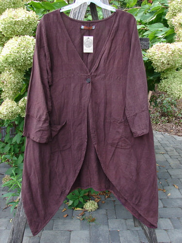 Barclay NWT Linen Geoides Pocket Duster in Armagnac Red Plum Size 1, features a single button closure, asymmetrical hem, and large patch pockets, offering a stylish, loose fit for creative expression.