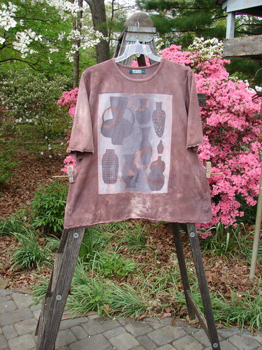 Barclay Three Quarter Sleeved Cafe Tee Vase Mottled Mushroom Size 2 displayed on a hanger with a rounded ribbed neckline, A-line shape, three-quarter sleeves, and a vase-themed design.