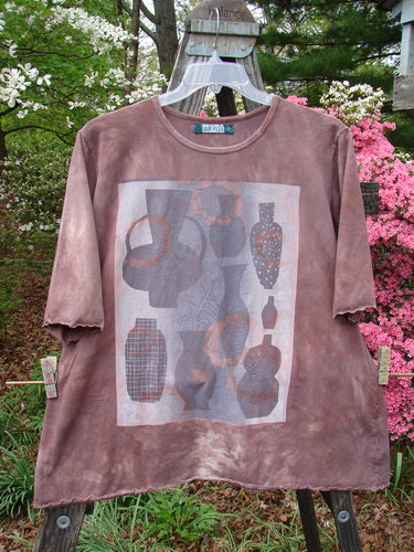 Barclay Three Quarter Sleeved Cafe Tee Vase Mottled Mushroom Size 2, featuring a rounded neckline, A-line shape, and three-quarter sleeves with a beautiful vase-themed print on organic cotton.