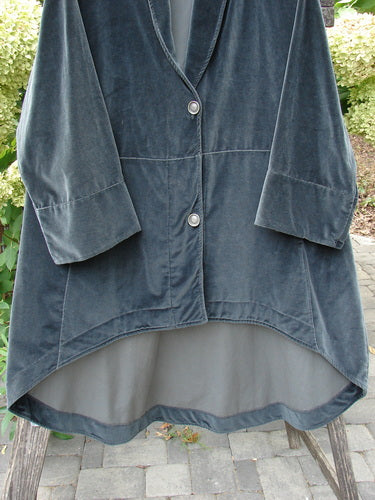 Barclay NWT Velvet Opera Pocket Coat in unpainted blue black, features a single-breasted design, three-quarter-length sleeves, high-low hem, and two front buttons, showcasing Bluefishfinder's vintage charm.