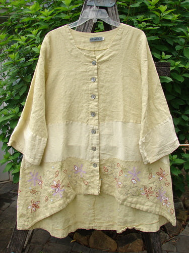 Barclay Linen Wonderland Sectional Banded Cardigan Daisy Chain Celery Size 1 features a whimsical daisy chain pattern, belled sleeves, and pearly buttons, embodying creative vintage flair.