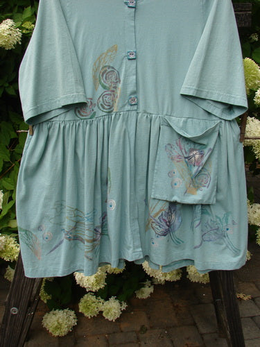 Barclay Flower Garden Tunic Dress Dragonfly Aloe Size 2 with a ceramic three-button front, open lower front, pleated skirt, and painted pocket, showcasing a spring dragonfly theme.