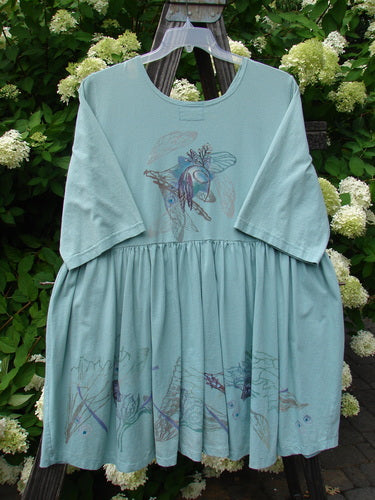 Barclay Flower Garden Tunic Dress Dragonfly Aloe Size 2, featuring a bird design, ceramic buttons, open lower front, pleated skirt, and external painted pocket.