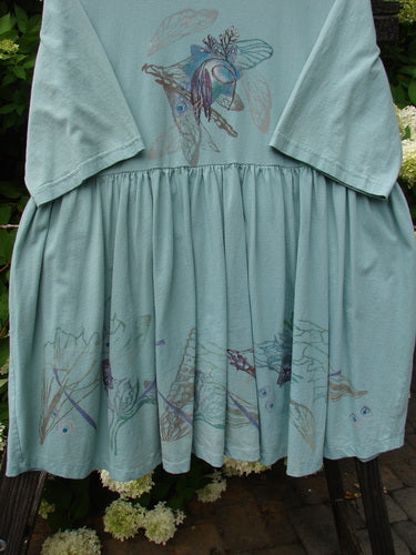 Barclay Flower Garden Tunic Dress Dragonfly Aloe Size 2 with butterfly design, three-button front, pleated skirt, rounded neckline, and external painted pocket.