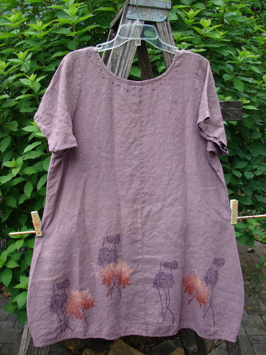 Barclay Linen Urchin Dress Necklace Leaf Dusty Plum Size 0 featuring a unique painted hemline, downward waist seam, and a slight reverse bell shape with tiny floral patterns, crafted from medium weight linen.