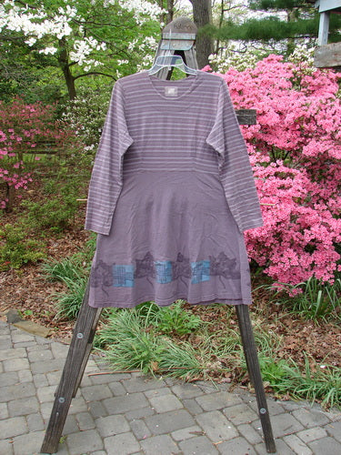 1999 Fitted Circle Dress Dried Pod Grey Plum Stripe Size 0 displayed outdoors, highlighting its empire waist, vertical pleats, flared skirt, round neckline, and longer sleeves.