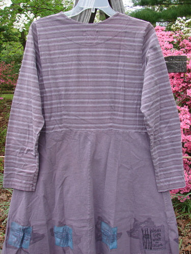 1999 Fitted Circle Dress Dried Pod Grey Plum Stripe Size 0 displayed on a clothes rack, featuring a flared skirt, empire waist seams, rounded neckline, and longer sleeves.