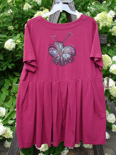 Barclay Boxcar Dress Rear Blossom Cranberry Size 2 featuring a butterfly motif, deep squared neckline, empire waist, wide pleats, and a baby doll shape, made from medium weight cotton jersey.