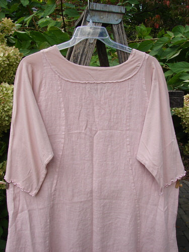 Barclay NWT Linen Le Jardin Cotton Sleeve Pocket Dress: A light pink tunic with a wide neckline, three-quarter scalloped sleeves, and straight silhouette, showcasing vintage elegance from BlueFishFinder.com.