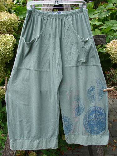 Barclay Flutter Bottom Crop Cargo Pant Medallion Vine Size 0 features wide-leg design, elastic waistband, and front patch pockets with circular mandala prints, capturing a unique, vintage-inspired style in organic cotton.