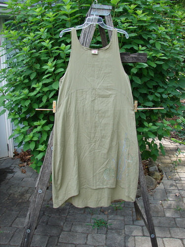 Barclay Batiste Slip Dress Floral Reach Seed Size 0, featuring a shallow neckline, empire waist, and floral pattern, captured swaying gently outdoors, embodying Bluefishfinder.com's vintage-inspired creative freedom.