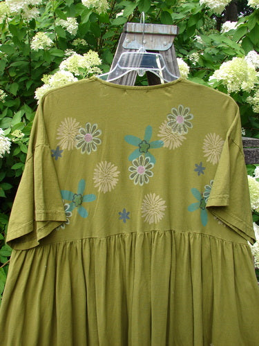 Barclay Tree Top Dress in Olive with floral blossom pattern, featuring vintage buttons, V-neckline, and a flouncy gathered lower. Size 3, perfect for spring.