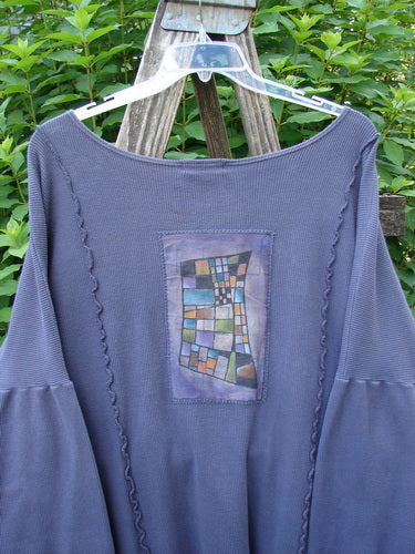 Barclay Patched Thermal Curl Pocket Cardigan Geos Royal Orchid Size 3, showcasing dolman sleeves, full button front, and two drop front pockets, featuring vertical curved stitchery and a shirttail hemline.