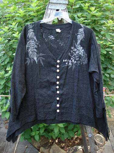 Barclay Linen Tiny Button Dip Side Cardigan Fern Shadow Black Size 0 displayed on a rack, showcasing a deep V-neck, three-quarter sleeves, and shell buttons, reflecting Bluefishfinder.com's vintage aesthetic.