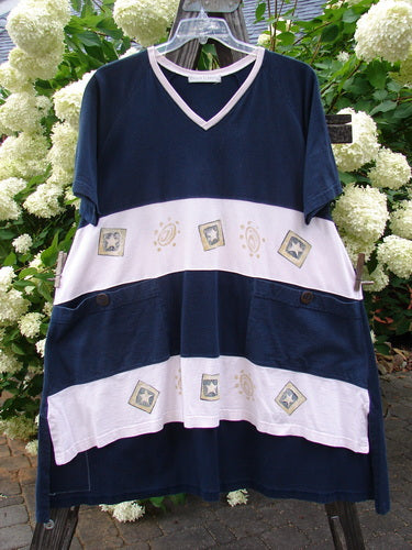 1998 Cricket Top Star Game Crew Blue Size 2. Blue and white striped shirt with unique vented hemline, front exterior pockets with numeral buttons, ribbed V-neckline, and Blue Fish Games patch.