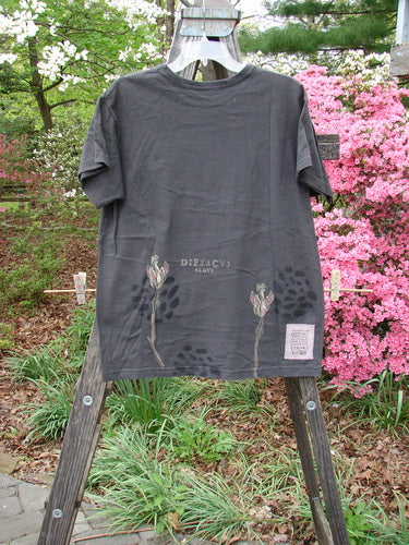 1998 Botanicals Short Sleeved Tee Triple Sprout Raven Size 0 displayed on a rack, featuring a thicker ribbed neckline and colorful botanical prints, embodying vintage Blue Fish Clothing style.
