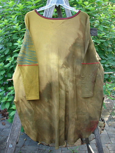 Close-up of the Barclay Thermal Contrast Revival Top Tulip Bronze OSFA, highlighting its medium-weight cotton thermal fabric with ribbed sleeves and neckline, and featuring a unique tulip-themed design.