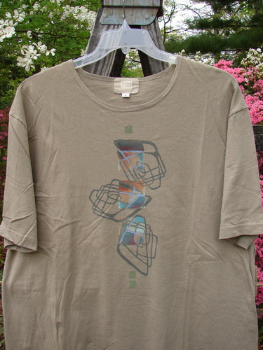 2000 Artist Choice Short Sleeved Tee Geo Dove Size 1, featuring a graphic design, rolled and ribbed neckline, drop shoulders, and a longer generous shape, made from mid-weight organic cotton.