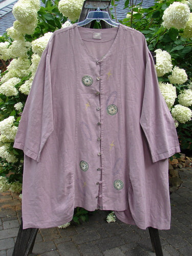 1999 Parlor Jacket Circle Florals Heliotrope Size 2, featuring nine abalone buttons, V-shaped neckline, gathered front and back, two side pockets, and a painted circle flower theme on linen fabric.