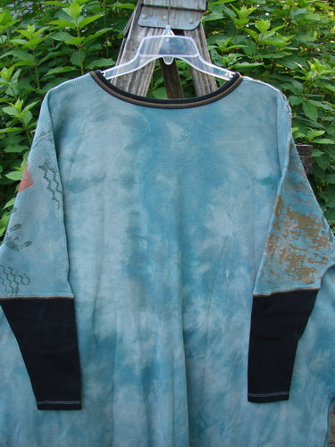 Barclay Thermal Contrast Revival Top Farm Turq OSFA displayed on a hanger, showcasing ribbed sleeves, rounded neckline, and A-line shape with side vents, embodying BlueFishFinder's unique vintage style.