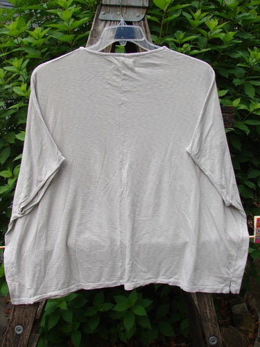 Barclay Cotton Slub Cricket Cap Sleeve Tee Leaf Play Natural OSFA displayed on a hanger, featuring cap sleeves, a rounded hemline, and a seamless shoulder, embodying Bluefishfinder.com's vintage and creative style ethos.