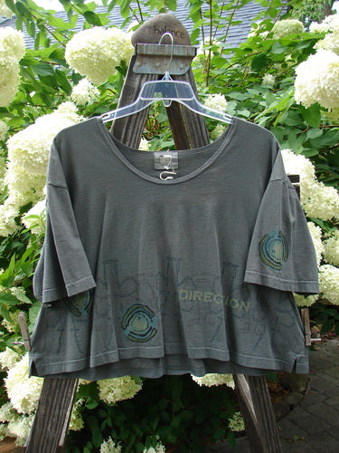2000 NWT City Side Crop Tee Top in Grid, a grey shirt on a swinger. Features include big paint sleeve accents, a wide swingy shape, vented sides, and a softly rolled neckline. Size 2.