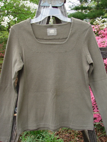 1999 Square Neck Rib Top Unpainted Mud Size 1 displayed on a hanger, showcasing long sleeves, thicker ribbed material, double-paneled square neckline, and slight A-line flare, perfect for layering or mix and match.