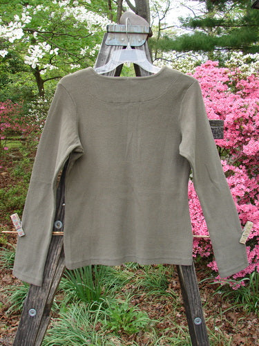 1999 Square Neck Rib Top Unpainted Mud Size 1 on a swinger, showcasing long sleeves, thick ribbed material, and a square double-paneled neckline.