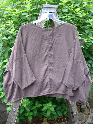 Barclay Twill Atmosphere Overlayer Boxy Top features a sweetly rounded neckline and three-quarter dolman sleeves with a wide, boxy, flowy shape, perfect for mix and match in spring styles.