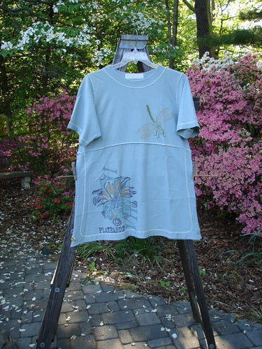 1998 Botanicals Snapdragon Top Birdsong Size 1 displayed on a swinger, showcasing a feminine flared shape, rounded neckline, and superior botanicals theme paint, perfect condition from the Spring Botanicals Collection.