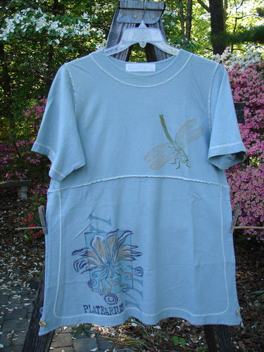 1998 Botanicals Snapdragon Top Birdsong Size 1 featuring a dragonfly design, rounded neckline, flared shape, vented sides with button accents, and exterior stitchery, made from organic cotton.
