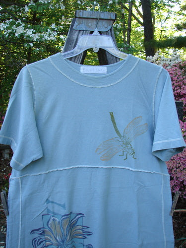 1998 Botanicals Snapdragon Top Birdsong Size 1: Blue t-shirt featuring a dragonfly design, rounded neckline, slightly flared shape, vented sides with button and loop, and exterior stitchery.