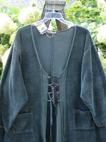 Barclay NWT Chenille Rippie Tie Robe Jacket Unpainted Urban Forest Size 2 displayed on a swing, showcasing double drop front pockets, A-line shape, and smooth vertical cotton paneling.