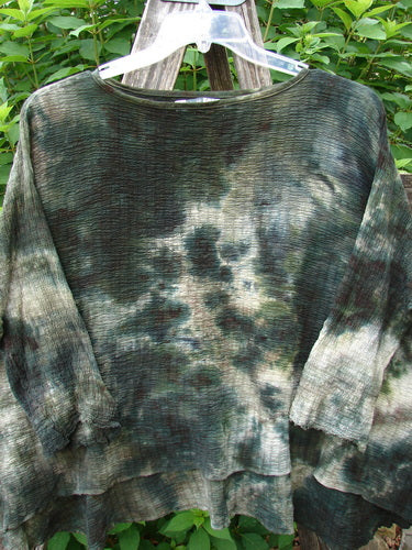 Barclay Crinkle Gauze Crop Top Mottled Forest Black Sky OSFA displayed on a hanger, showcasing its boxy shape, three-quarter dolman sleeves, high-low hemline, and soft, textured gauze fabric.