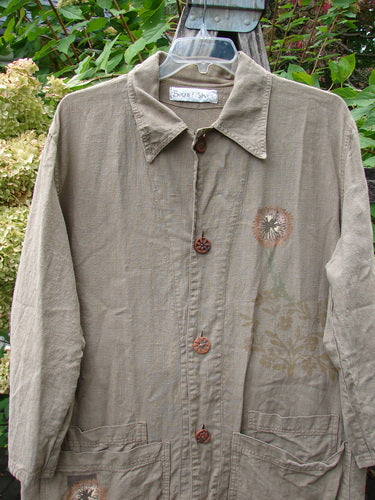 1998 Botanicals Herbary Jacket Dandelion Drift Dust Size 1: An olive-beige, long-sleeved jacket with wooden buttons, pointed collar, floral motifs, and front patch pockets, embodying Bluefishfinder's vintage, creative, and expressive style.