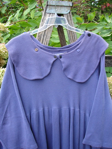 1992 Thermal Silly Collar Dress Unpainted Periwinkle Size 2, featuring a Peter Pan collar, three-quarter sleeves, and an empire waist with a voluminous A-line shape, displayed on a clear hanger.