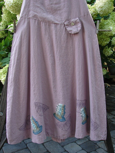 1999 Patio Jumper Fancy Bake Bowls Heliotrope Size 0: Mid-weight linen A-line jumper with a sleeveless upper, deep arm openings, gathered rear waist, tiny shell button pocket, and stacked fancy baker bowl theme paint.