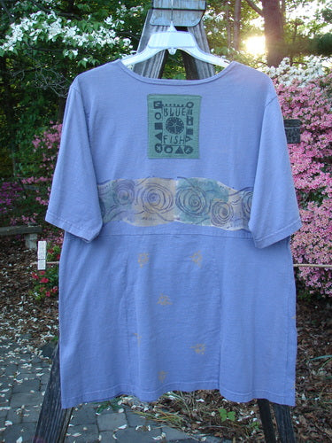 1993 3 Square Dress Wind Band Periwinkle OSFA displayed on a hanger, showcasing its rounded neckline, six sectional panels, slight empire waist seam, and signature blue fish patch on the back.