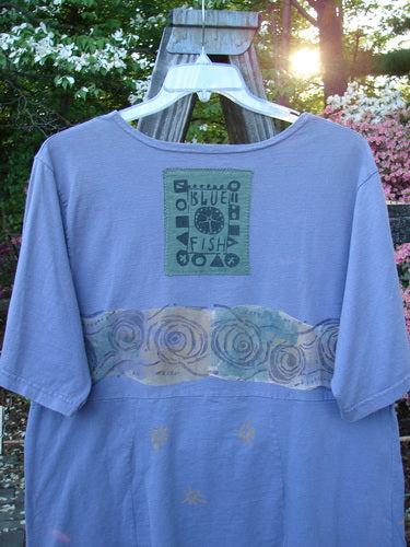 1993 3 Square Dress Wind Band Periwinkle OSFA featuring a blue design, rounded neckline, six sectional panels, and a distinct rear signature Blue Fish patch. A rare collectible from the 1993 Spring Collection.