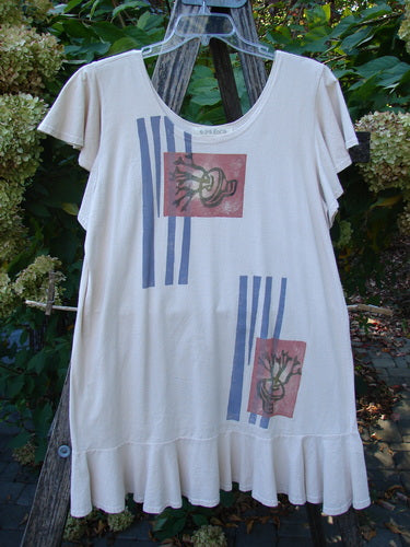 1996 Butterfly Dress Garden Path Birch Bark Size 1 features a cream tunic with flared silhouette, ruffled hem, and rust graphic prints, hanging outdoors, embodying BlueFishFinder's vintage, expressive style.