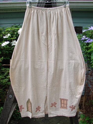 1993 Resort Bell Skirt Window Teadye Size 2 featuring horizontal and vertical seams, uniquely cut front pockets, and a house-themed painted design, showcasing a slightly pegged shape and rear kick vent.