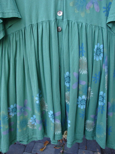 Barclay Tree Top Cardigan Dress Floral Blossom Spearmint Size 3 features a knee-length, gathered tiered hem with a button-front bodice, showcasing a floral print in blue, lavender, and pale yellow.