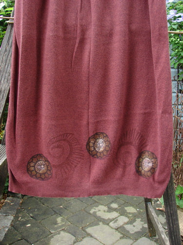 1997 Cotton Cashmere Skirt Pinwheel Marled Stained Glass Size 2 displayed on a wooden chair, highlighting its full elastic waistband and two deep side pockets.