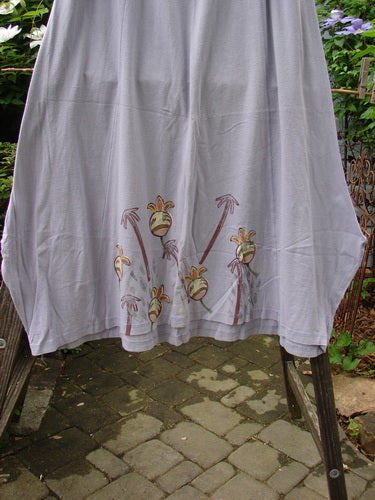 1998 Botanicals Gillyflower Skirt Bud Wisteria Size 2 features a full elastic waist, sectional curvy seams, generous hip, specialized hem, and classic botanical garden bud pattern on mid-weight organic cotton.