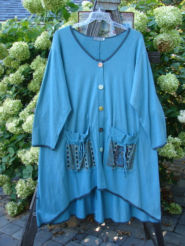 Barclay Cotton Hemp Contrast Tie Pocket Jacket Seahorse Watercolor Size 2, featuring a rounded neckline, full button front, and two exterior painted pockets on a swinger.