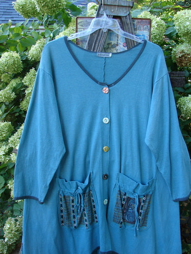 Barclay Cotton Hemp Contrast Tie Pocket Jacket Seahorse Watercolor Size 2 on hanger, featuring a rounded neckline, full button front, and two exterior painted pockets.