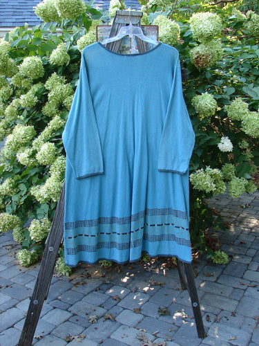 Barclay Cotton Hemp Contrast Tie Pocket Jacket Seahorse Watercolor Size 2 on a clothes rack with rounded neckline, button front, drop pockets, and varying hemline.