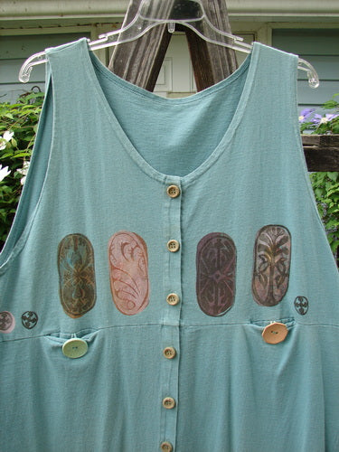 1993 Button Jumper Vintage Carved Stone Ocean Size 2, featuring a wider V-shaped neckline, deeper arm openings, numerous wooden-rimmed buttons, and two oversized vintage buttons on tunnel pockets, displayed on a hanger.