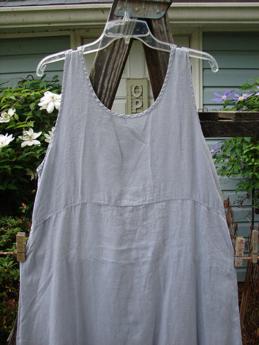 1999 Handkerchief Linen Sunbeam Dress Fish Water Size 1 displayed on a hanger, featuring an empire waist seam, full-length sweeping skirt, and sectional panels with a sweet fish theme paint.